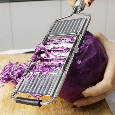 coupe légumes manche métallique