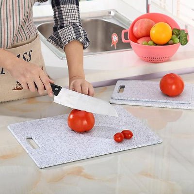 planche à découper aliments variés composite