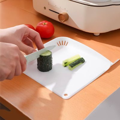 planche à découper anti écoulement