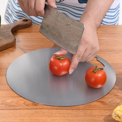 planche à découper en titane ronde