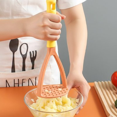 Presse purée efficace ergonomique